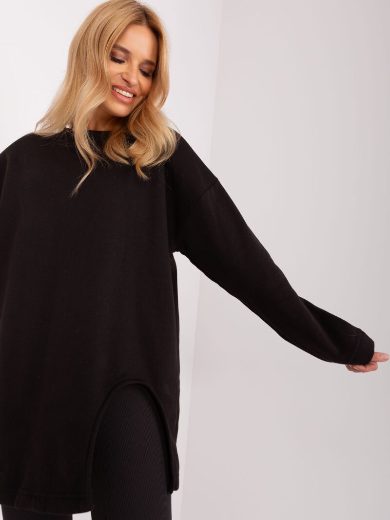 Czarny komplet damski z bluzą oversize i legginsami w prążek - obrazek 5